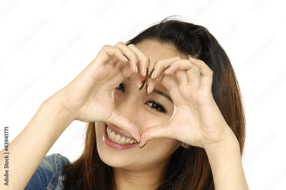 young woman creating a frame with her hands young woman creating a frame with her hands