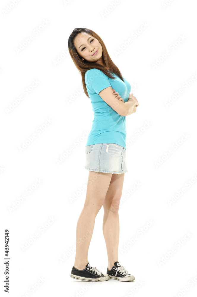 young casual girl standing on white background young casual girl standing on white background