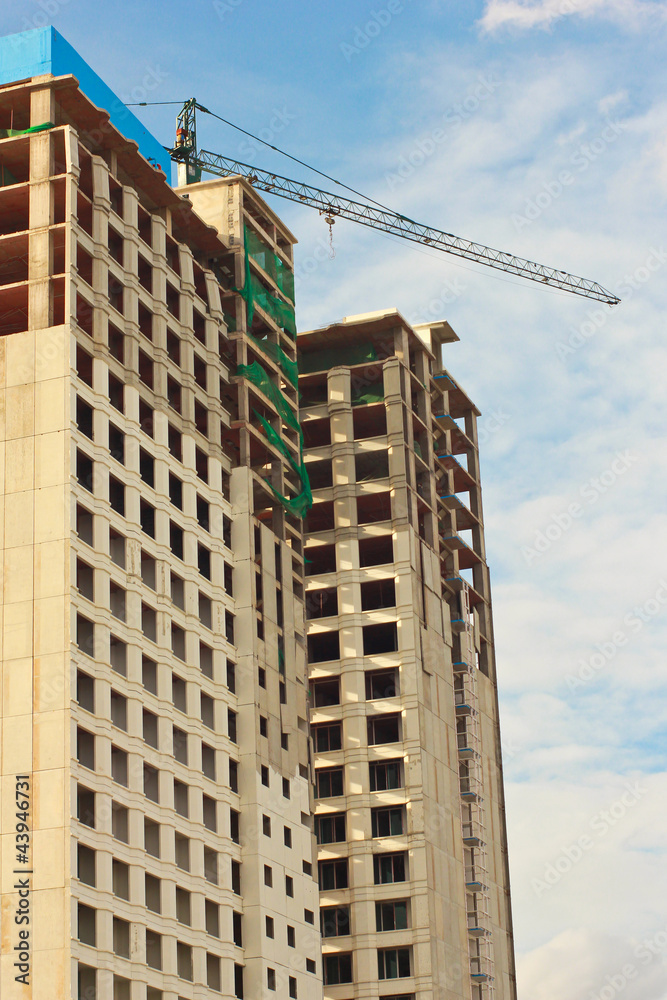 Under construction building with blue sky Under construction building with blue sky