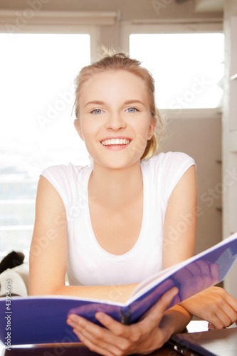 happy and smiling teenage girl with big notepad Free Download happy and smiling teenage girl with big notepad - GFXLoad