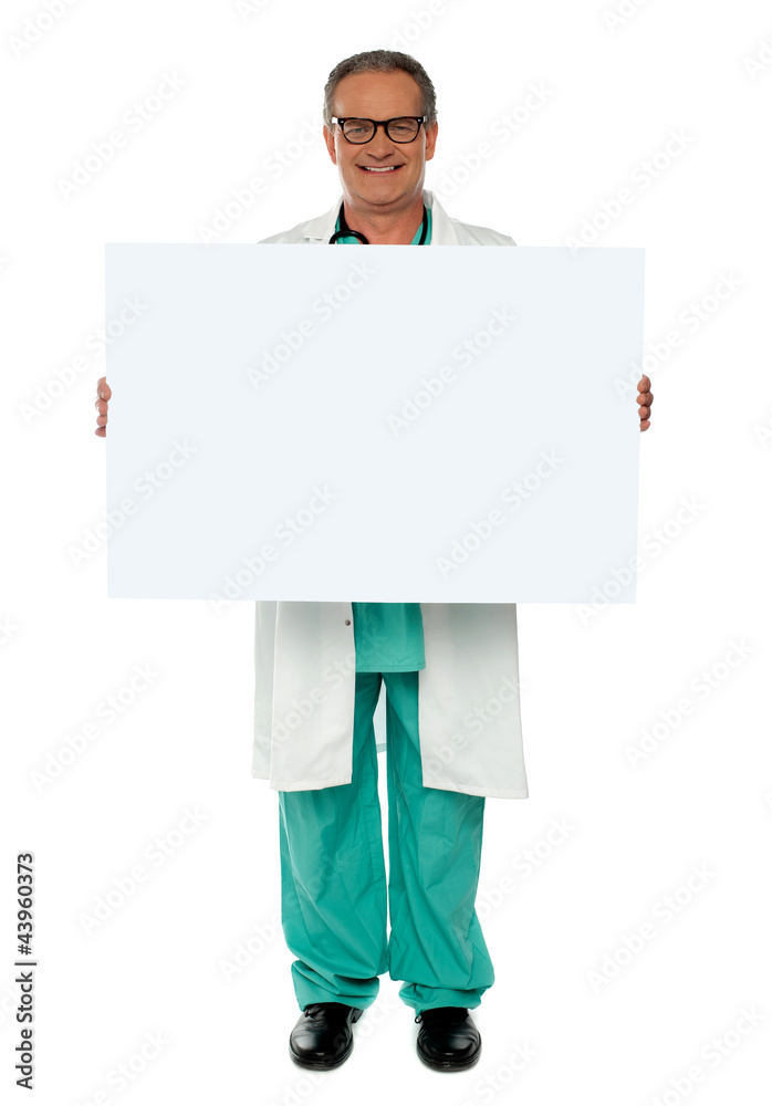 Senior medical professional displaying banner ad Senior medical professional displaying banner ad