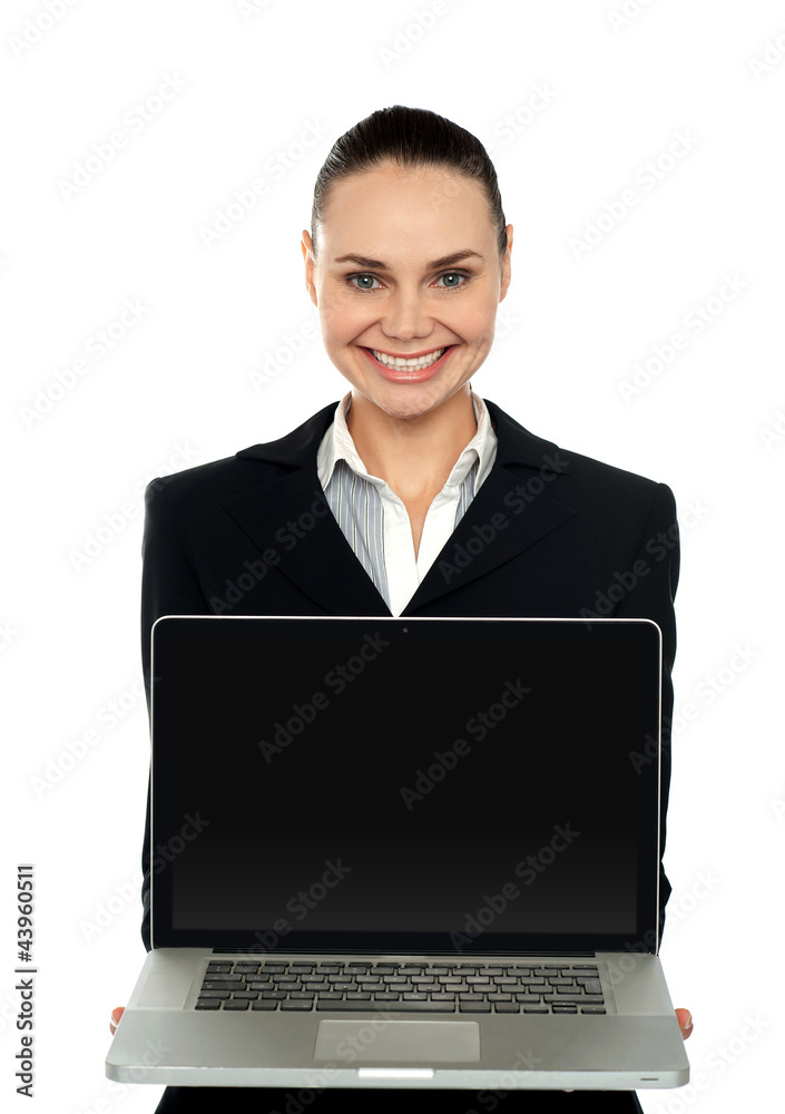 Female executive presenting brand new laptop Female executive presenting brand new laptop
