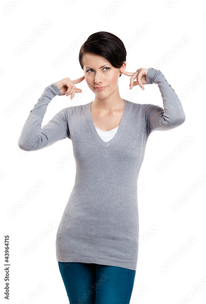 Closing ears with fingers, isolated on white Closing ears with fingers, isolated on white