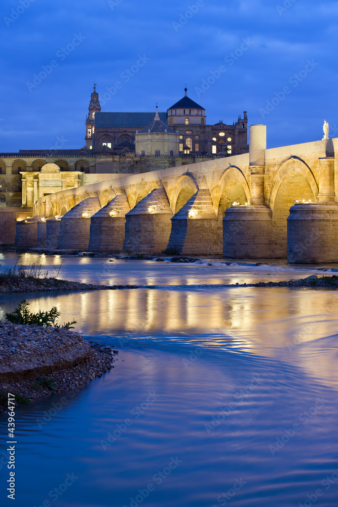 Roman Bridge on Guadalquivir River at Dawn
