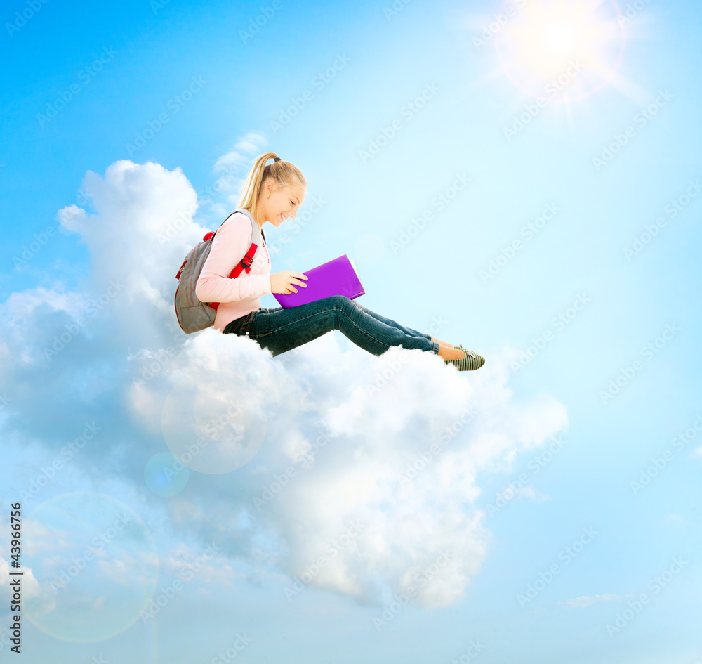 School Girl or Student Sitting on a Cloud and Reading a book School Girl or Student Sitting on a Cloud and Reading a book