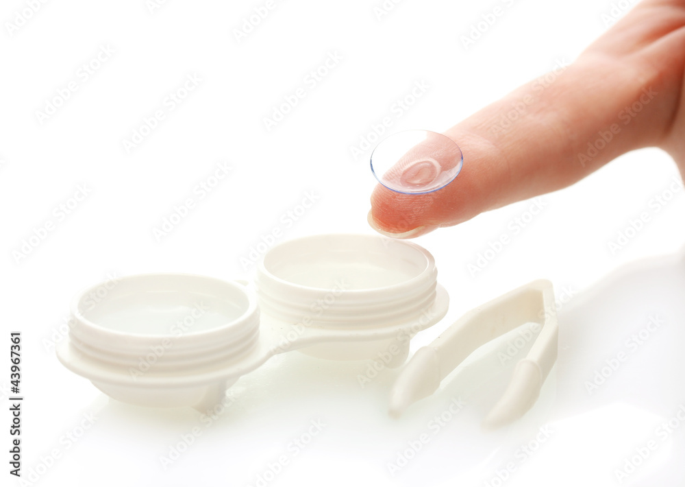 contact lenses in containers and tweezers, isolted on white contact lenses in containers and tweezers, isolted on white