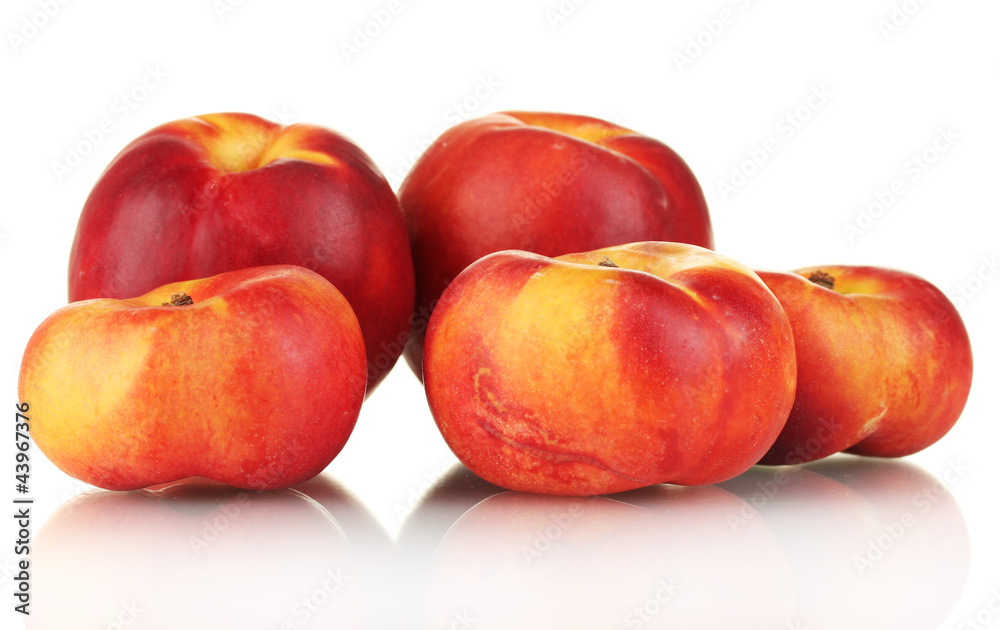 Ripe nectarines isolated on white close-up Ripe nectarines isolated on white close-up