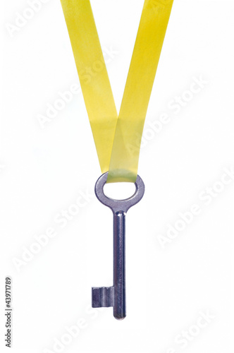 Key blue with yellow tape photo