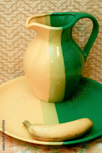 Jug and banana photo