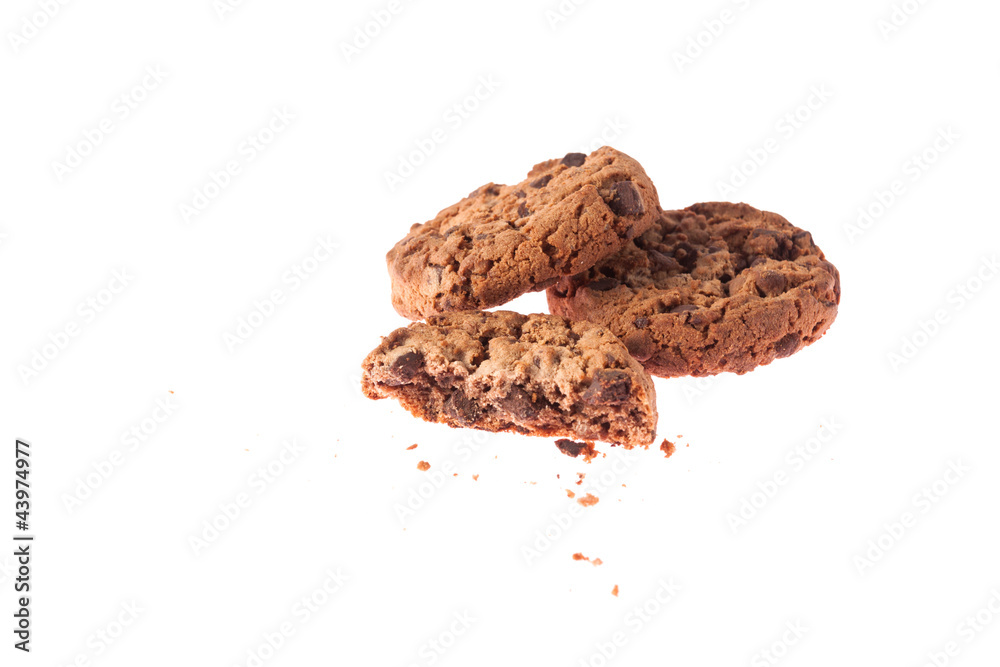 Chocolate cookie with crumbs side view Chocolate cookie with crumbs side view