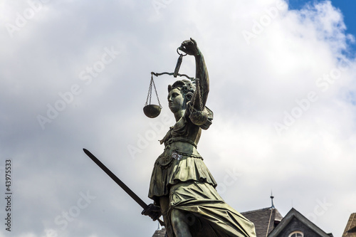 Statue of Lady Justice in front of the Romer in Frankfurt