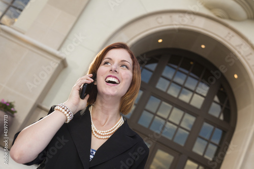 Happy Businesswoman On Cell...