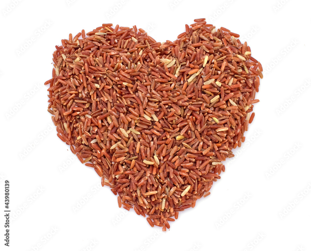 heart shape brown rice isolated on white background heart shape brown rice isolated on white background