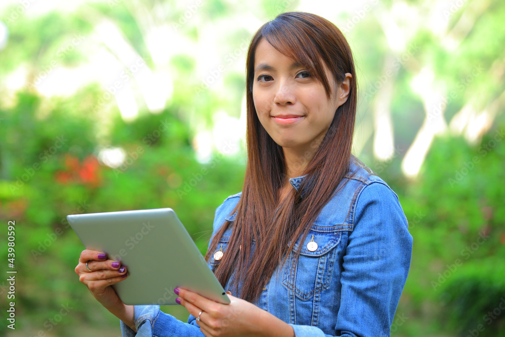 young woman using tablet touch computer