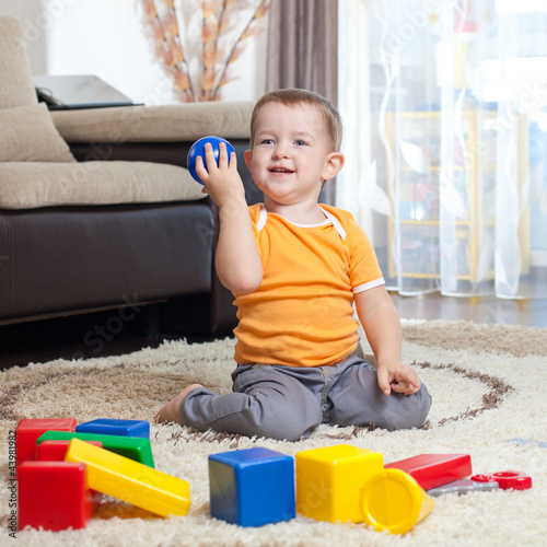 Child playing with building...