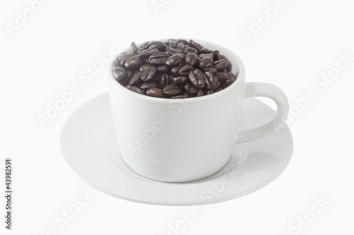 a cup of coffee beans isolated on white background