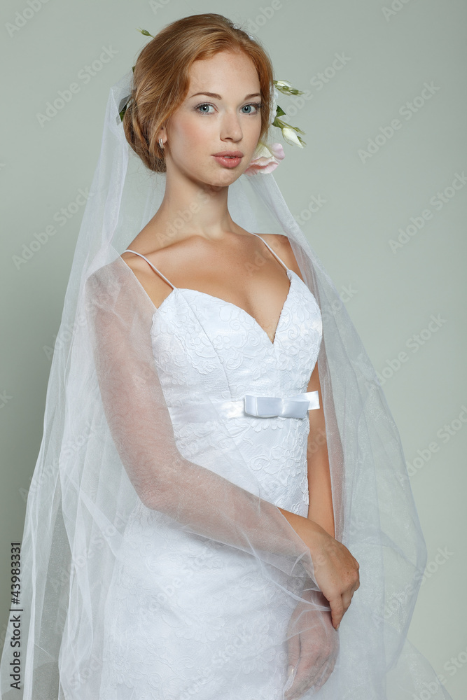 A beautiful sexual bride is in a wedding-dress A beautiful sexual bride is in a wedding-dress