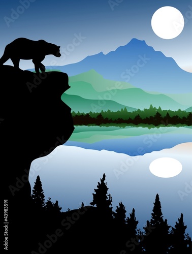 bear silhouette with forest and lake background