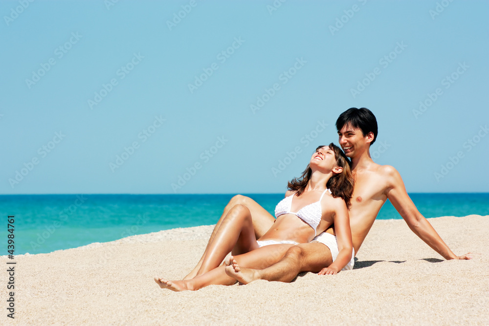 Portrait of Man and Woman at the Beach by Sea Portrait of Man and Woman at the Beach by Sea