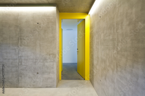 door of entry.a flat,.corridor, concrete wall © alexandre zveiger