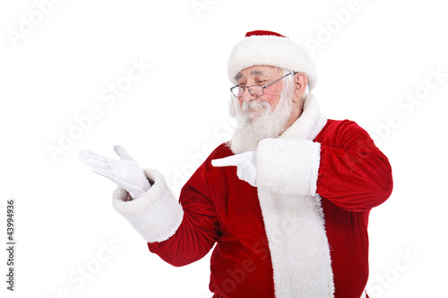 Santa pointing in hand