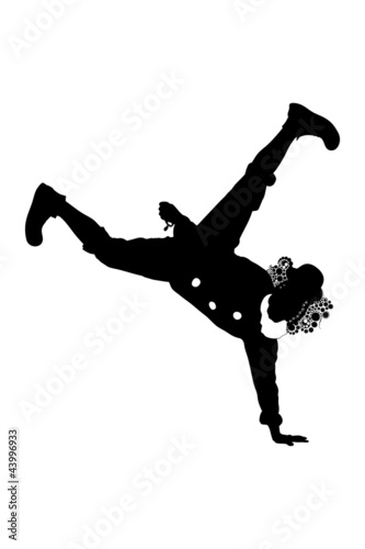 Silhouette of a clown standing on one hand