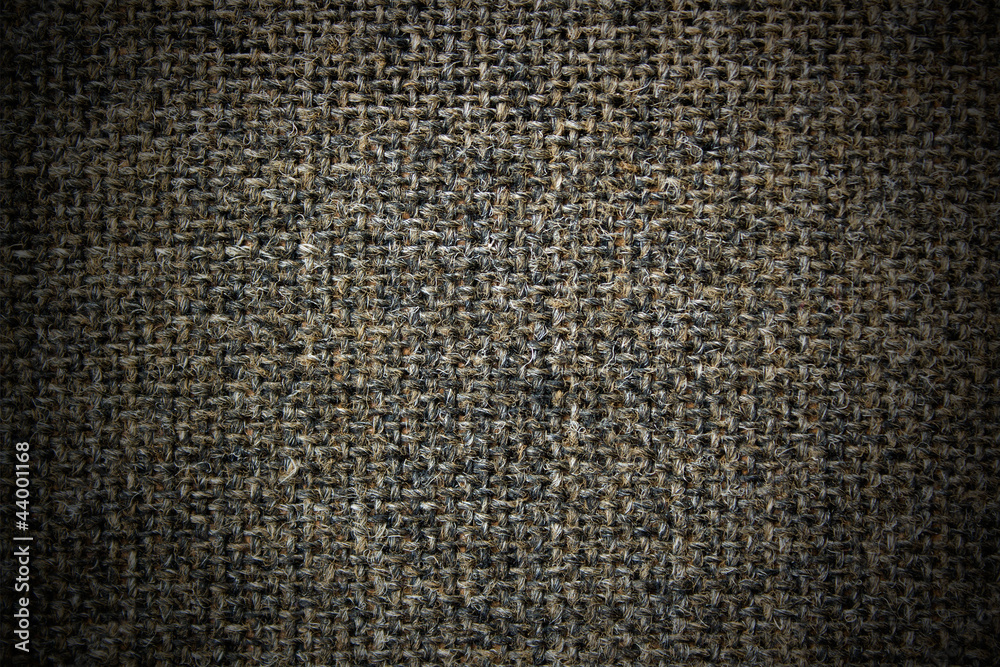 Dark canvas texture or background with vignette Dark canvas texture or background with vignette