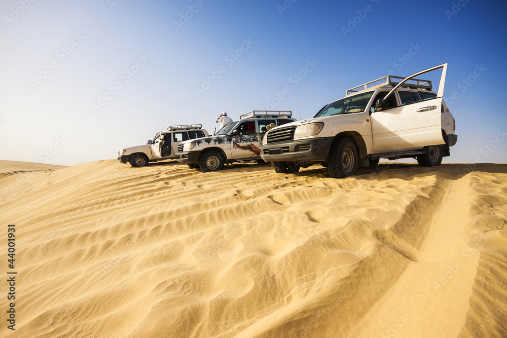 4x4 vehicles on a dune in the Sahara Desert, Tunisia