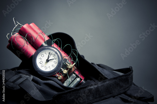time bomb inside a backpack in a subway station photo