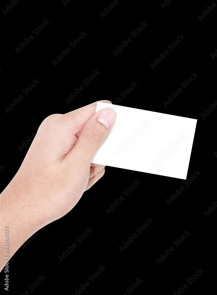 hand holding white business card hand holding white business card