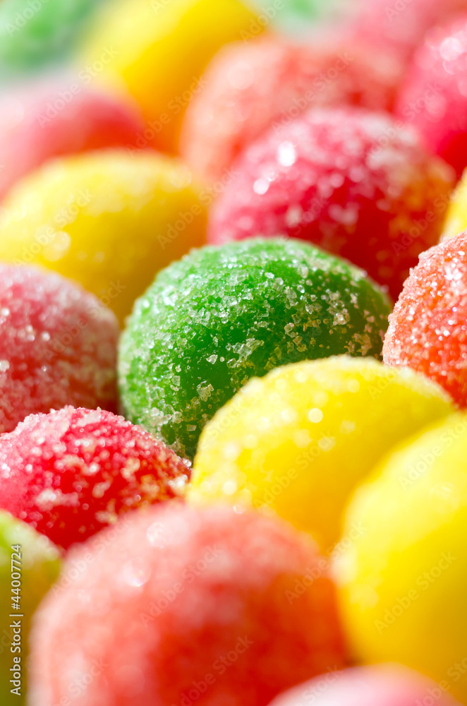 The background of multicolored dragee close-up