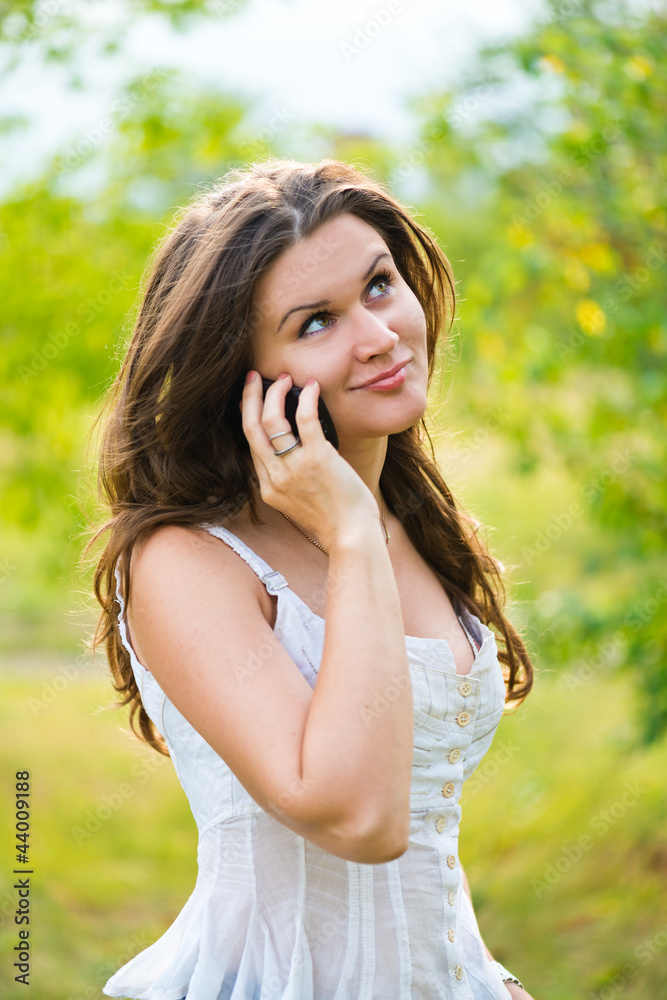 Outdoor portrait of young woman with phone Outdoor portrait of young woman with phone