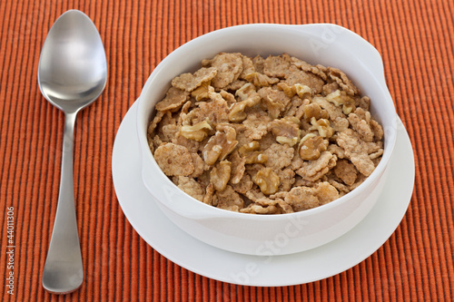 cereals with walnut in the white bowl