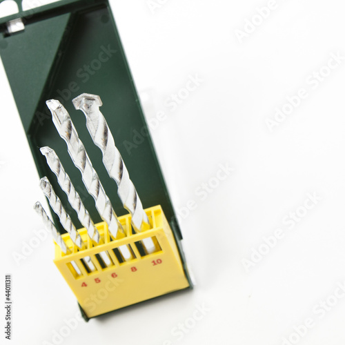 Set of drills in a green box