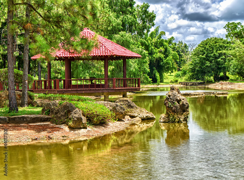 Pavilion over a lake on a beautiful japanese garden