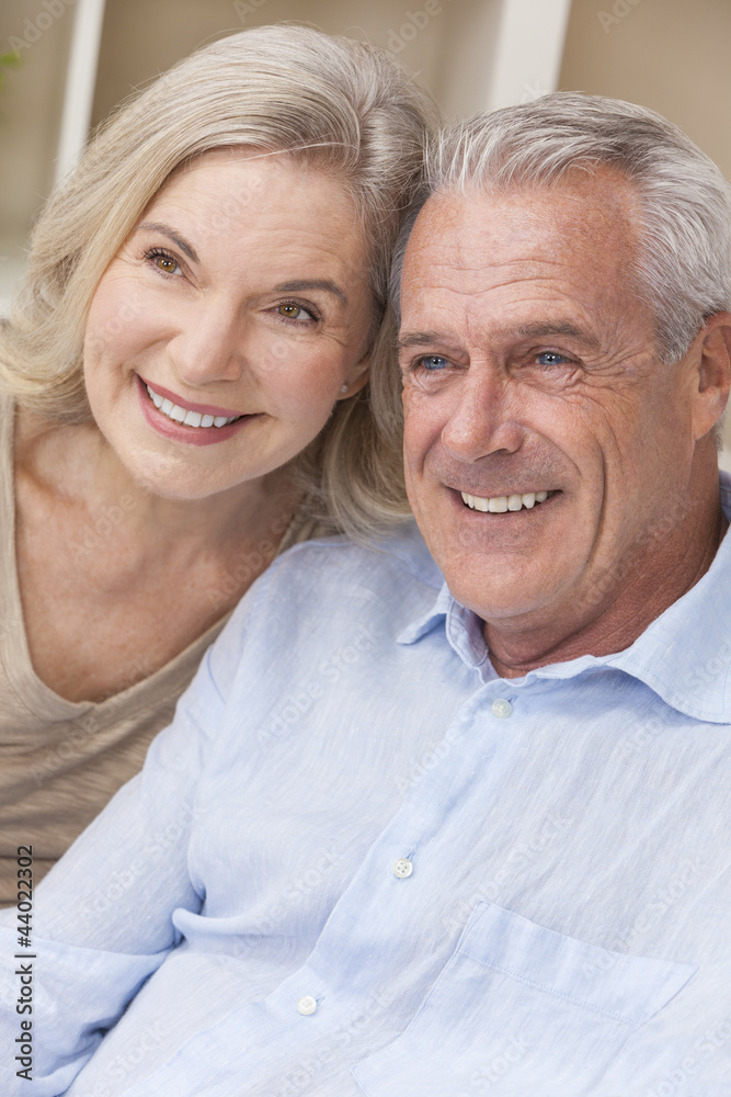 Happy Senior Man & Woman Couple Smiling at Home Happy Senior Man & Woman Couple Smiling at Home