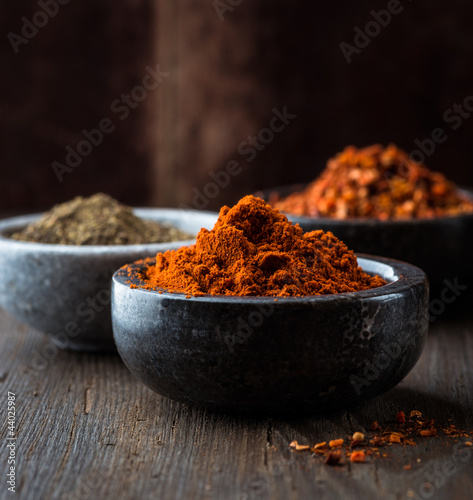 Fototapeta Naklejka Na Ścianę i Meble -  Assorted spices in small bowls
