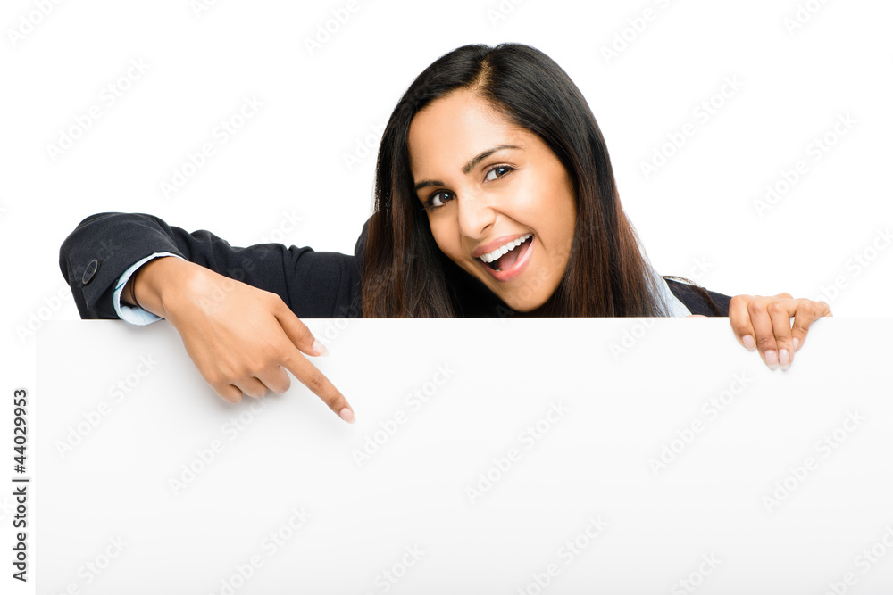 Portrait of attractive young indian woman holding billboard on w Portrait of attractive young indian woman holding billboard on w