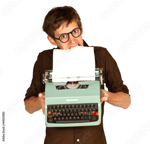 Man Pulling Paper from a Vintage Typerwriter with his Teeth