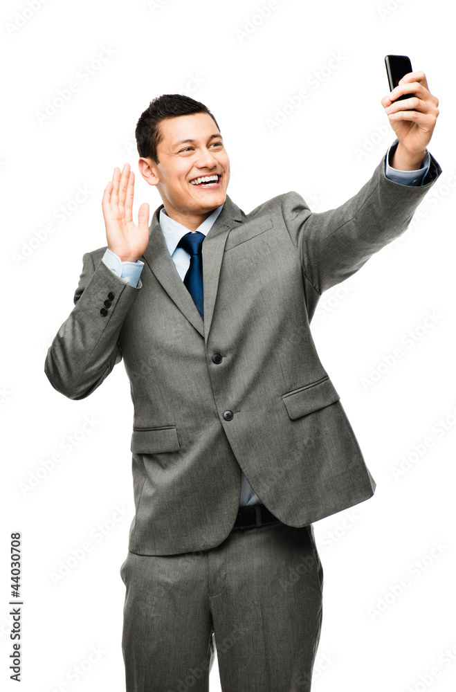 Asian businessman video messaging mobile phone white background Asian businessman video messaging mobile phone white background