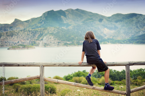 Child looking at a landscape © demachy