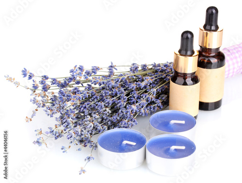 Fototapeta Naklejka Na Ścianę i Meble -  Lavender flowers with aroma oils and candles isolated on white