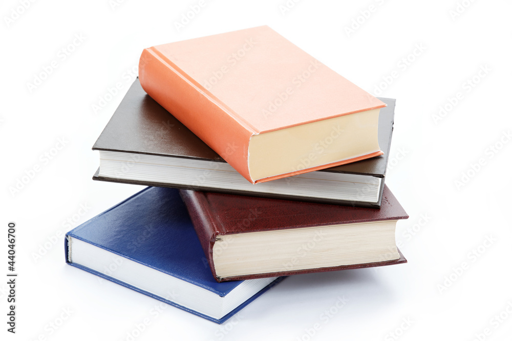 A stack of books on a white background. A stack of books on a white background.