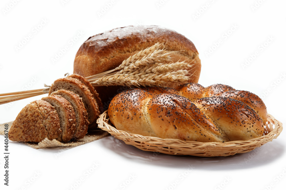 Fresh breads for a variety isolated on white.