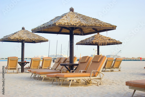 Fototapeta Naklejka Na Ścianę i Meble -  chaise lounge on a beach in Dubai