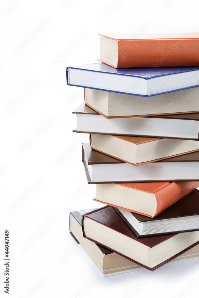 A stack of books on a white background. A stack of books on a white background.