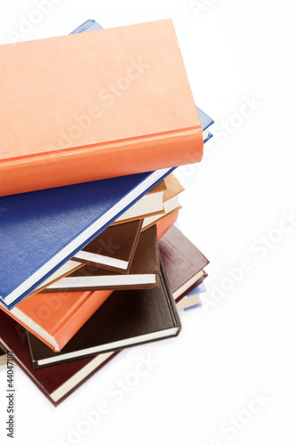 A stack of books on a white background.