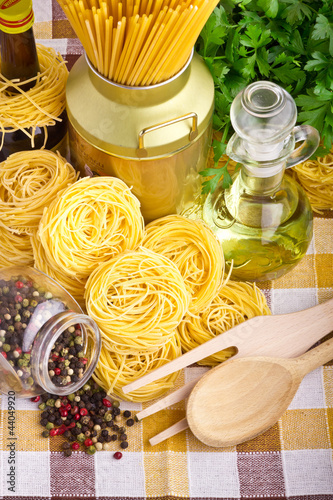 Italian pasta  with olive, spices, cheese and parsley