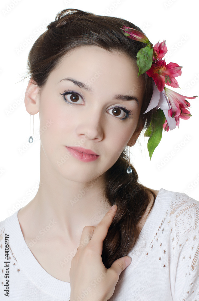 Portrait of the beautiful girl with flowers in hair Portrait of the beautiful girl with flowers in hair