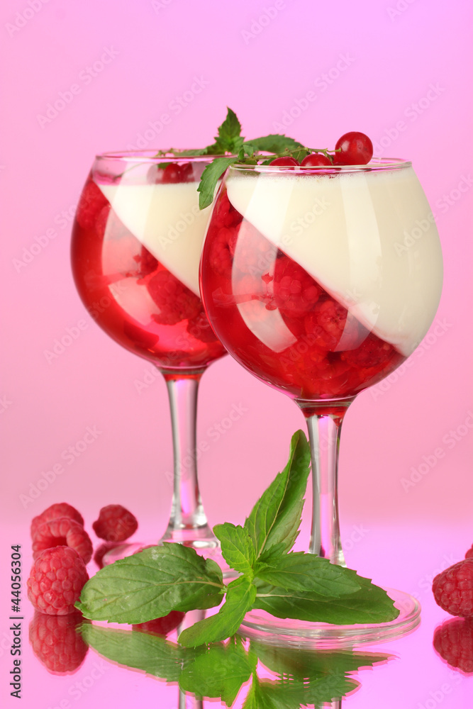 fruit jelly with berries in glasses on pink background fruit jelly with berries in glasses on pink background